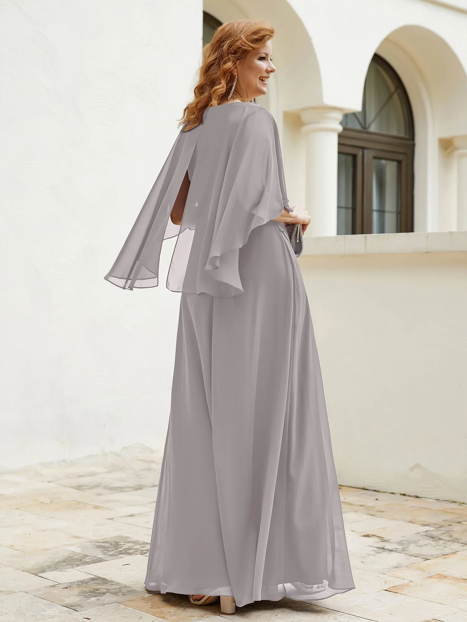 Dress Adorned with Beaded Elegance and Flutter Sleeves Silver
